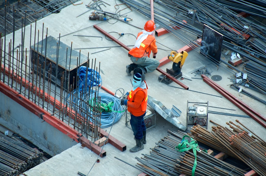Construction project manager inspecting site blueprint